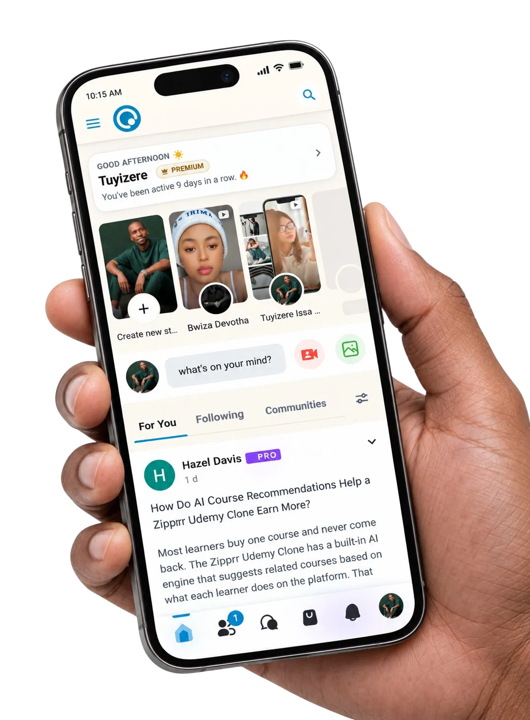 A hand holding a phone showing the IzeChat home feed, with stories, posts and community tabs.